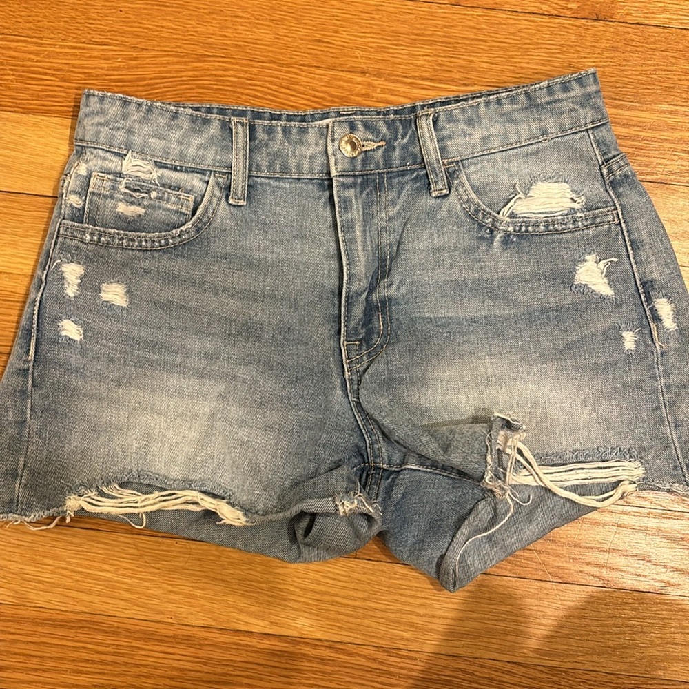 Mid Rise Denim distressed shorts